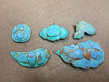 Thirty-one Chinese kingfisher feather ornaments in silver and gilt metal, Qing and 20th C.