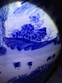 A Chinese blue and white fish bowl with a river landscape, 19th C.