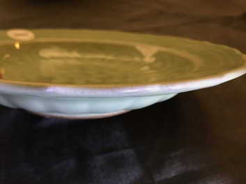 A Chinese celadon-glazed plate with underglaze lotus design, Qianlong