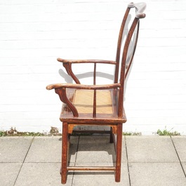 A Chinese elm wood &quot;official's hat&quot; armchair, 19th C.