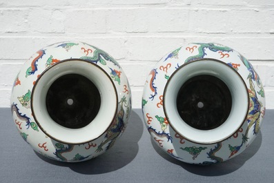 A pair of Chinese wucai dragon vases, Wanli mark, 19th C.