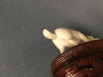 Two Chinese carved ivory groups of harvesting children, 1st half 20th C.