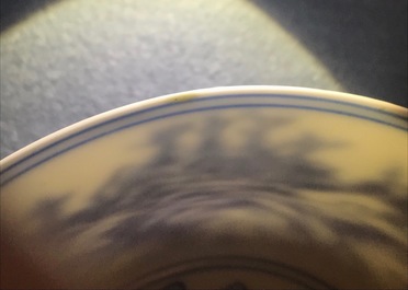 A Chinese blue and white bowl with a fine landscape, Yongzheng mark and of the period