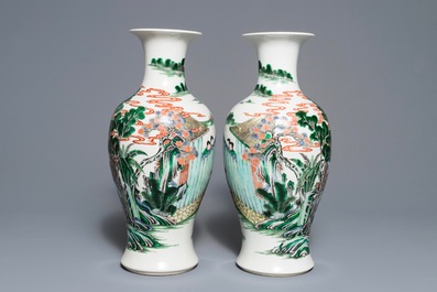 A pair of Chinese famille verte 'silk production' vases, 19th C.