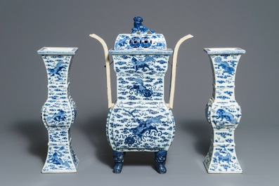 A Chinese blue and white 'Buddhist lions' altar set with incense burner, 19th C.