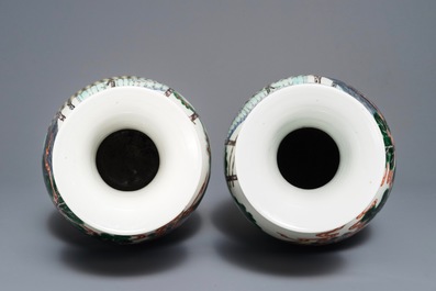 A pair of Chinese famille verte 'silk production' vases, 19th C.