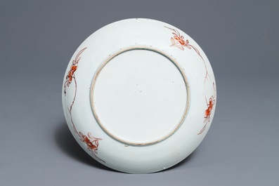 A fine Chinese famille rose plate with a bird among flowers, Yongzheng