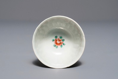 A Dutch-decorated Chinese export 'Adam &amp; Eve' cup and saucer, Yongzheng