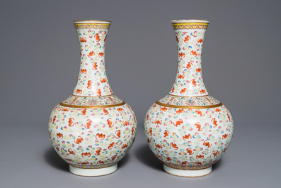 A pair of Chinese famille rose 'hundred bats' vases, Guangxu mark and of the period