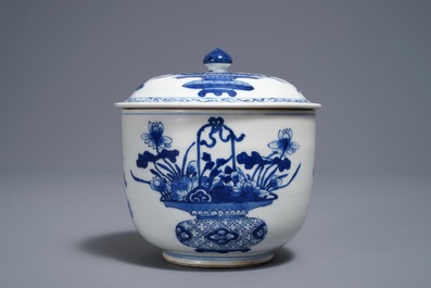 A Chinese blue and white bowl and cover with flower baskets, Kangxi