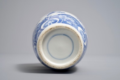 A Chinese blue and white vase with floral design, 18/19th C.