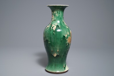 A Chinese famille verte vase with birds among foliage, 19th C.