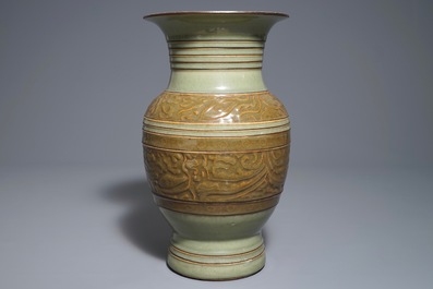 Een Chinese archa&iuml;stische celadon vaas met reli&euml;fdecor, 19e eeuw