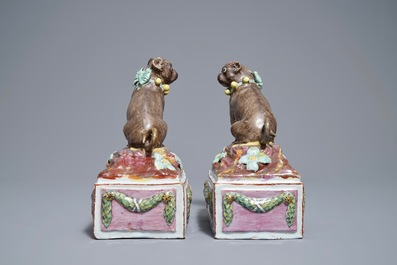 A pair of polychrome Tournai faience pugs, 18th C.