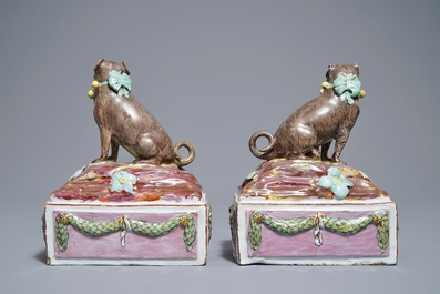 A pair of polychrome Tournai faience pugs, 18th C.