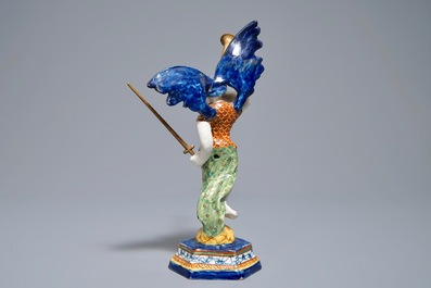 A polychrome Dutch Delft allegorical model of the angel 'Fame', 18th C.