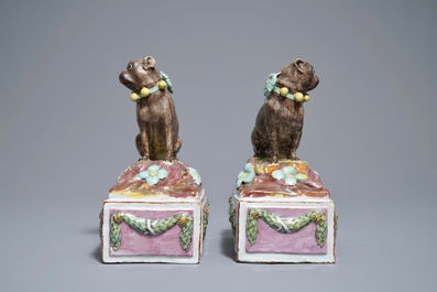 A pair of polychrome Tournai faience pugs, 18th C.