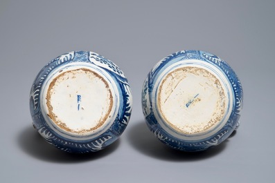 A pair of Dutch Delft blue and white silver-mounted jugs in Japanese Arita style, ca. 1700
