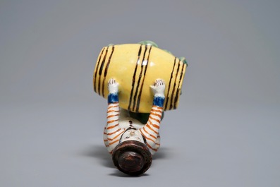 A polychrome Dutch Delft model of a wine merchant, 18th C.