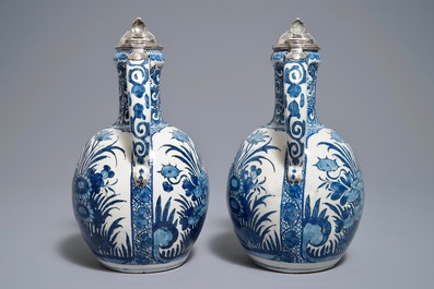 A pair of Dutch Delft blue and white silver-mounted jugs in Japanese Arita style, ca. 1700