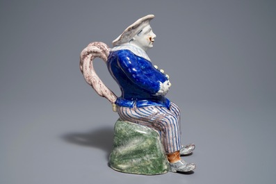 A polychrome Brussels faience figurative 'Jacquot' ewer, Stevens mark, 19th C.