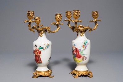 A pair of Chinese gilt bronze candelabra-mounted famille rose vases, Yongzheng