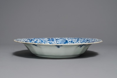 A lobed Chinese blue and white dish with fish, Kangxi