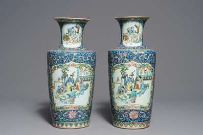 A pair of Chinese famille rose rouleau vases, 19th C.