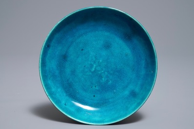 A Chinese monochrome turquoise-glazed brush pot and a plate, Kangxi