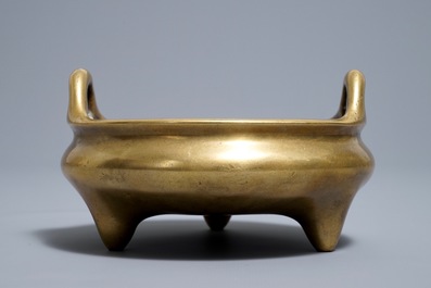 A Chinese bronze tripod censer, Xuande mark, 18th C.