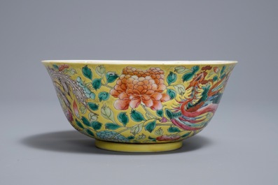 A Chinese famille rose on yellow ground 'phoenix' bowl, Qianlong mark, 19th C.