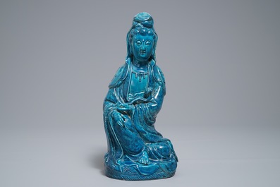 A Chinese turquoise-glazed and underglaze blue model of Guanyin, 19/20th C.