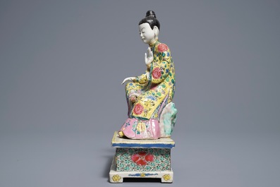 A Chinese famille rose model of a seated lady, Yongzheng
