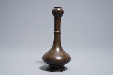 A Chinese gold-splashed bronze garlic head vase, Ming