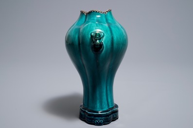 A Chinese monochrome turquoise-glazed vase on stand, 18th C.