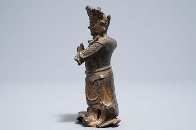 A Chinese bronze model of a guardian, Ming
