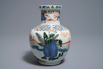 A Chinese wucai 'mythical beasts' vase, 19/20th C.