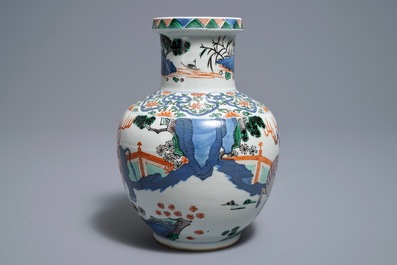 A Chinese wucai 'mythical beasts' vase, 19/20th C.