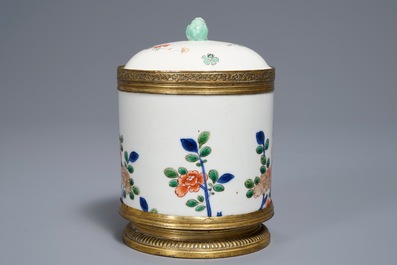 A Chinese famille verte and Japanese Kakiemon bronze-mounted jar and cover, Jiajing mark, 18/19th C.