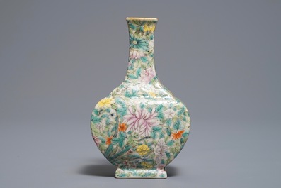 A Chinese eggshell famille rose millefleurs vase on stand, Qianlong mark, 18/19th C.