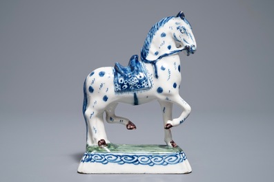 A fine Dutch Delft model of a horse on a ground, 18th C.