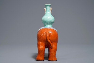 A Chinese famille rose elephant joss stick holder, 19th C.