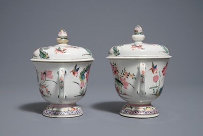 A pair of Chinese famille rose cups and covers with lotus flowers and ducks, Yongzheng