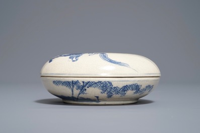 A Chinese blue and white seal paste box with the Immortal Li Tieguai, Kangxi mark, 19th. C.