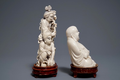 A Chinese ivory group of a family and a 'laughing Buddha' figure, ca. 1900