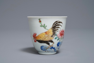 A Chinese famille rose cup and saucer with roosters, Yongzheng