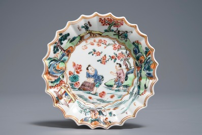 A Chinese famille rose cup and saucer with fishermen, Yongzheng