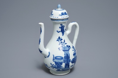 A Chinese blue and white ewer and cover with 'antiquities' design, Kangxi