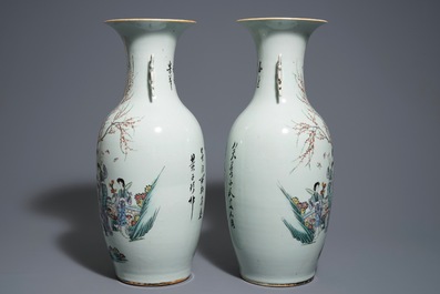 A pair of Chinese qianjiang cai vases with figures in a garden, 19/20th C.