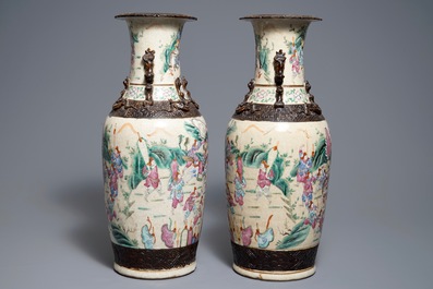 A pair of Chinese Nanking famille rose crackle-glazed vases with warriors, 19th C.